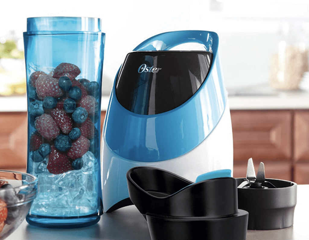 blue Oster My Blend silent blender with fruits and ice ready for blaming